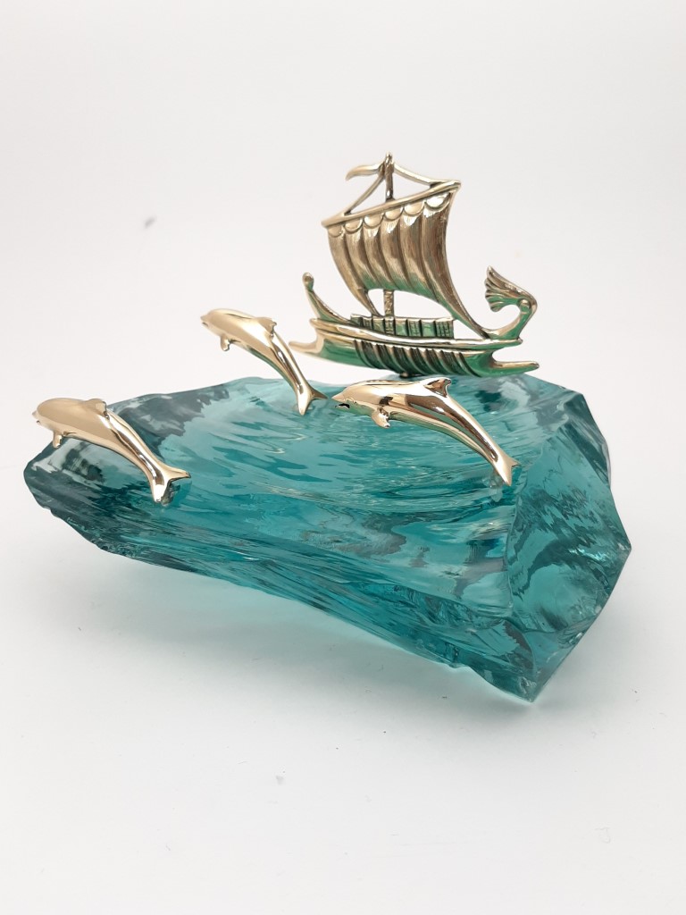 BRONZE ARGO WITH THREE DOLPHINS ON GLASS