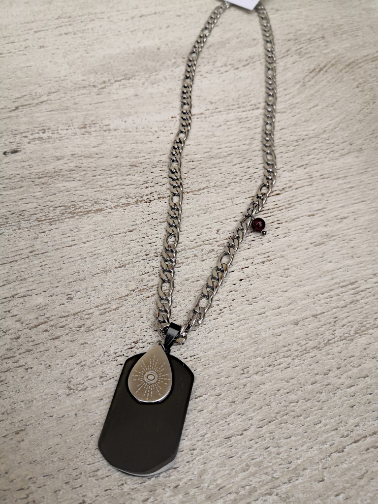 A handmade necklace made of stainless steel silver chain