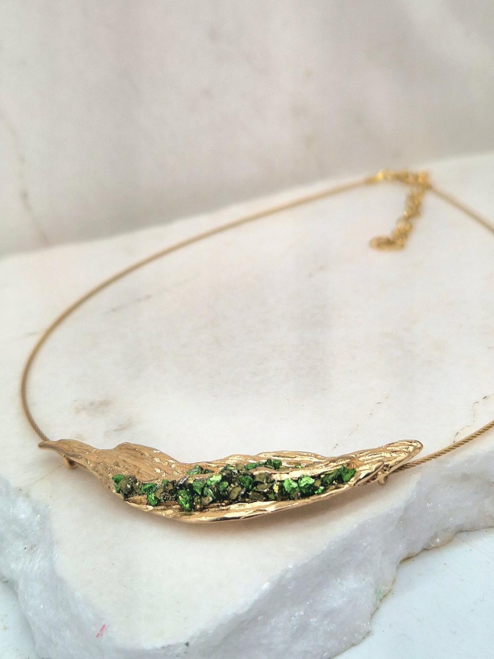 NECKLACE WITH BRASS PATTERN COLORED BY GOLDEN PATINA